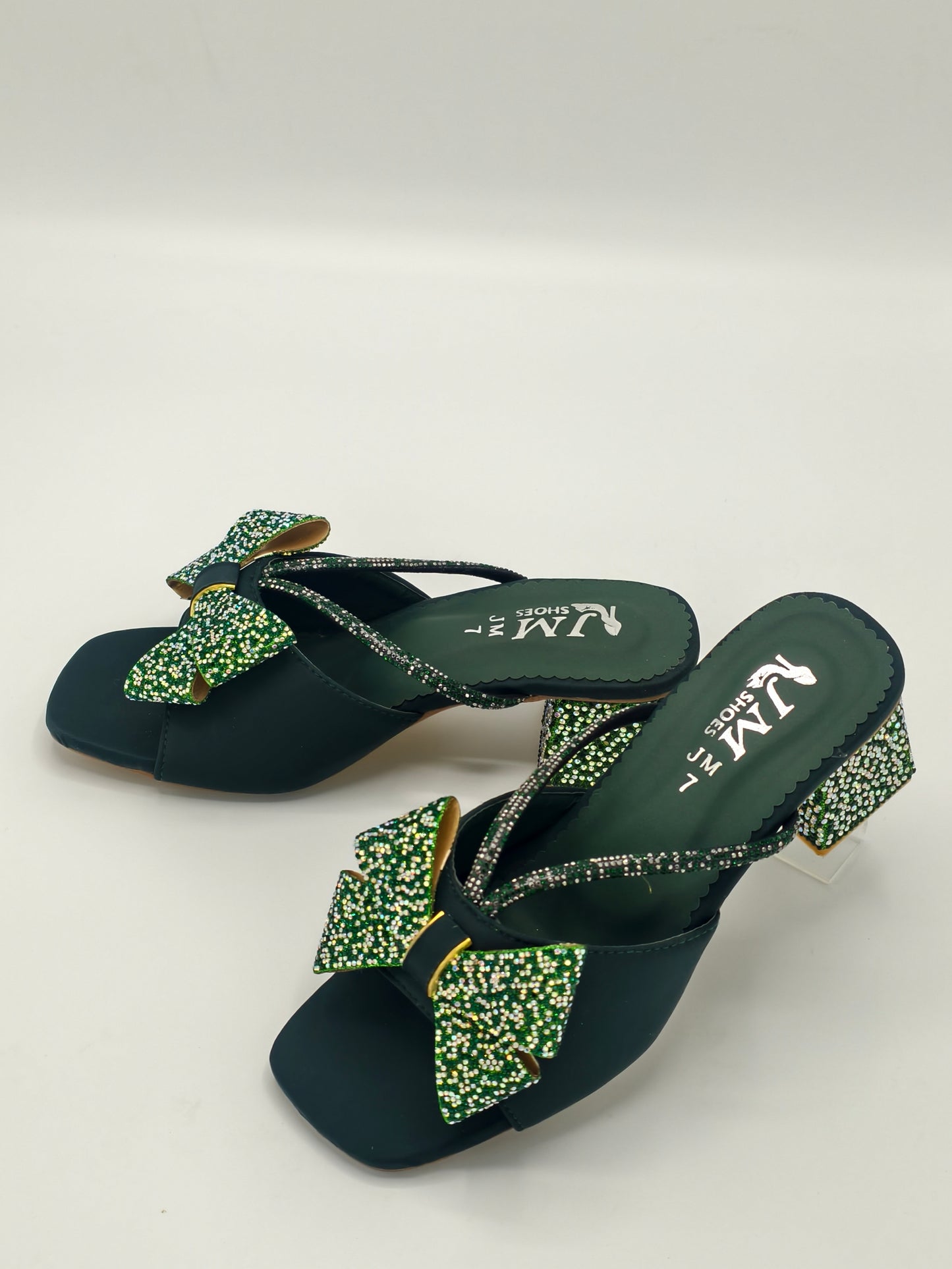 green heelup shoe